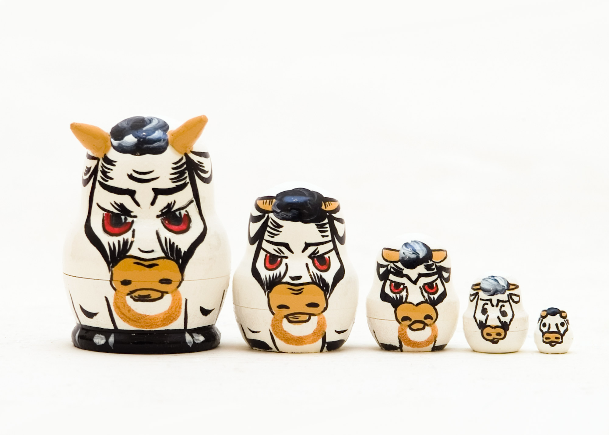 Buy Mini White Bull Nesting Doll 5pc./1" at GoldenCockerel.com